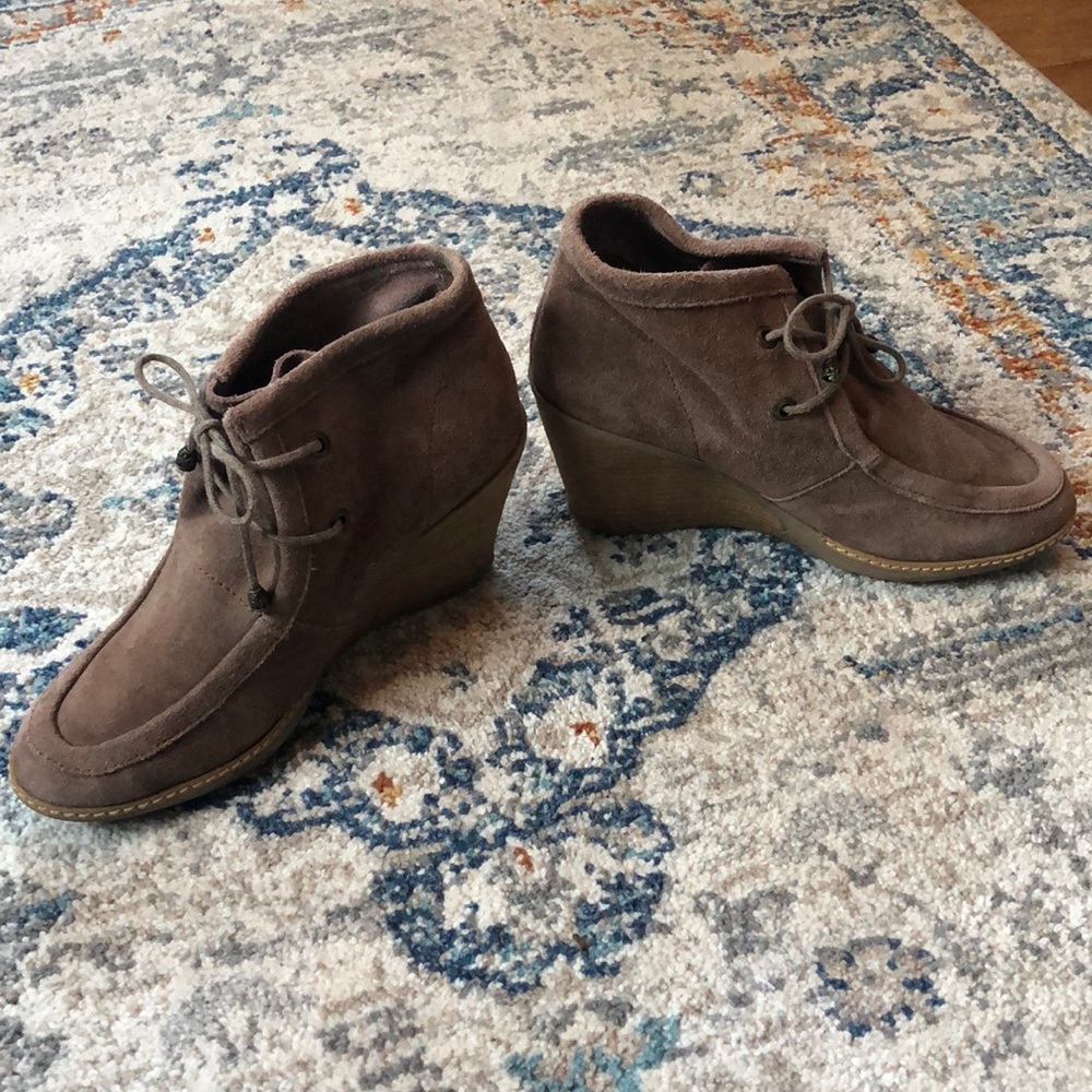 Moccasin style wedge booties.